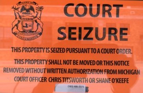 Court seizure sign at B.C. Motors