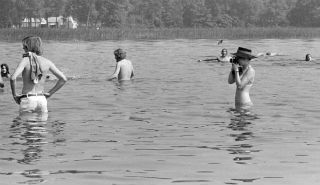 Festival goers skinny dipping in Goose Lake