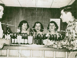 St. Joseph party in the Smith St. basement in 1951. (L to R) Tom Trelewski, Katie Noonan, Chickie Sanders, Madonna Fortin, and Ed McAllister