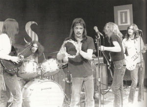 Detroit on stage: (L to R) Steve Hunter, John "Bee" Badanjak, Mitch Ryder, Ron Cooke, Brett Tuggle