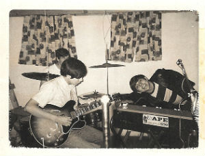 Bobby Balderrama (left) and Frank Rodriguez (right) rehearsing in the Rodriguez basement in the 1960's. The drummer is former Bay City Mayor and State Representative Charles Brunner who played briefly with the band in the 60's